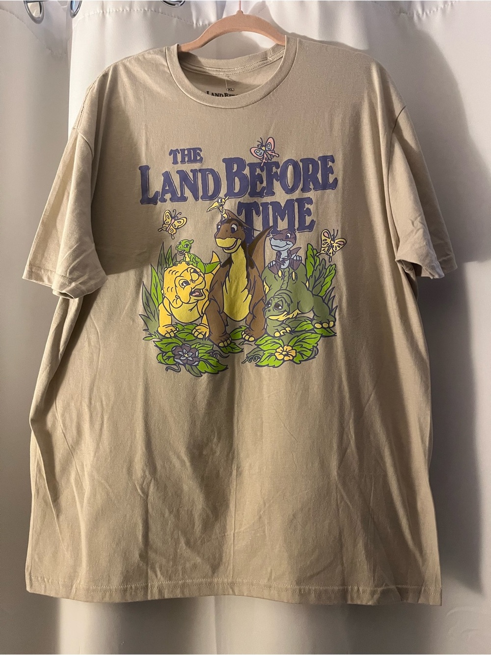Ripple Junction Beige Land Before Time Graphic Tee with Multicolor Dino Art